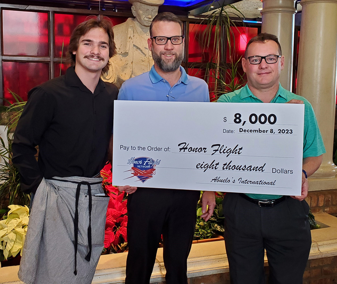 Abuelo's presenting a check for $8,000 to Honor Flight Network