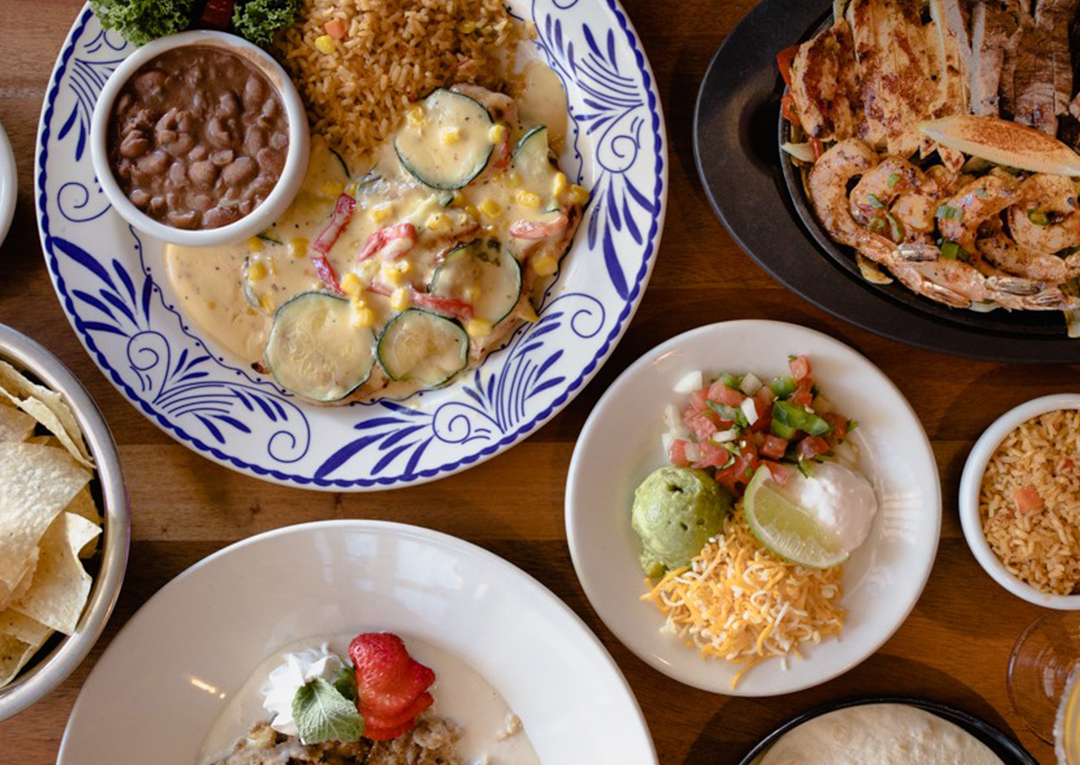 Selection of plated food on a table at Abuelo's